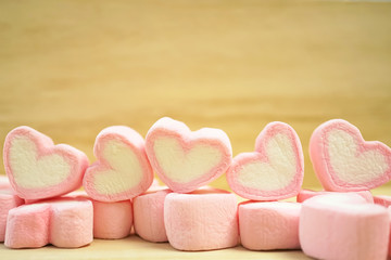 pink marshmallows hearts in soft color style for background
