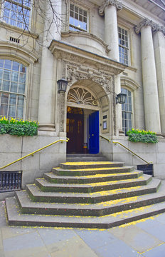London Borough of Kensington and Chelsea Town Hall entrance after a wedding with confetti on the steps.
