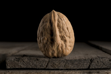Fototapeta premium Walnut on dark background