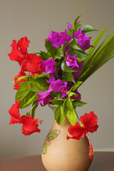 Tropical bouquet with drops.in a vase on the table. 