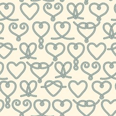 Seamless pattern made of rope hearts decorative knots