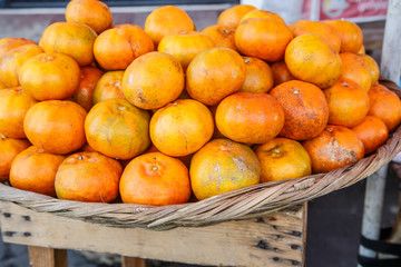 fresh mandarin group on basket from market