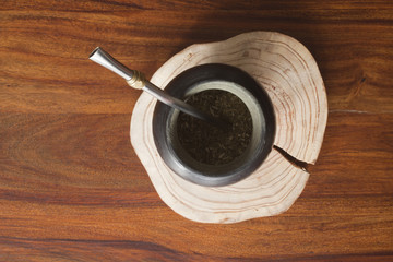 yerba mate gourd on wooden table
