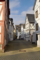 A picturesque street lined  with traditional  houses in the pretty town of Limburg Germany.