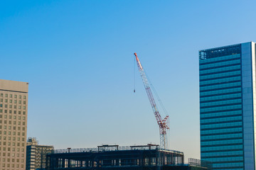 Fototapeta premium Crane and building construction site