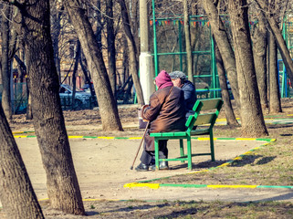 Two elderly women on bench