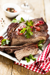Baked beef with cherries