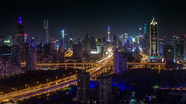 night light bright shanghai city interchange 4k time lapse
