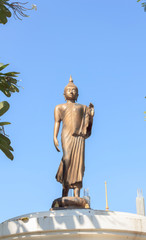 Buddha statue with blue sky