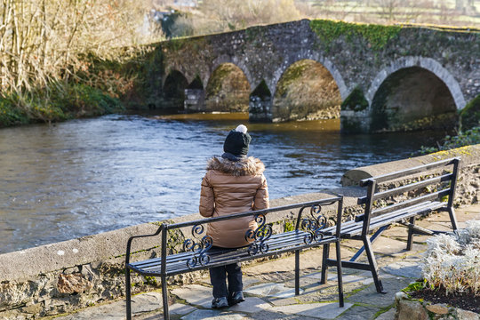 Young woman sitting and waiting