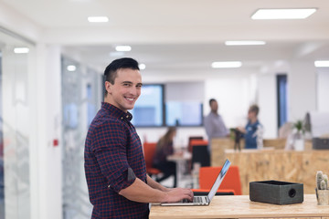 Fototapeta premium startup business, young man portrait at modern office