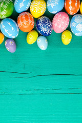 Easter eggs on wooden background