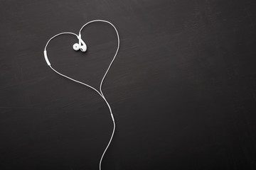 Fototapeta na wymiar Heart shaped headphones