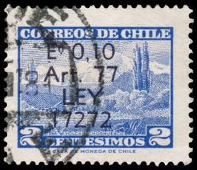 Stamp printed in Chile shows landscape with house