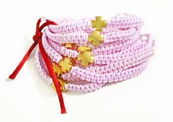 pink macrame bracelets with gold cross