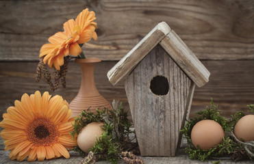 Easter decoration with eggs on wooden background