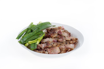 Bacon in white plate isolated on white background