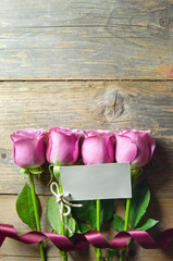 Flower background with blank gift tag