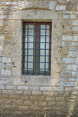 Fototapeta na wymiar Medieval window in castle of Lamia City, Central Greece 