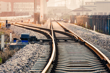Fototapeta premium Industrial railway track at dusk