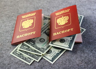 Доллары и российские загранпаспорта - obrazy, fototapety, plakaty