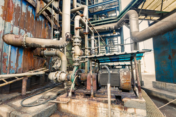 old industrial pipeline equipment in a abandoned steel mills