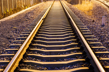 Industrial railway track at dusk