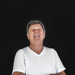Obraz premium laughing happy casual dressed man in studio