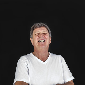 Laughing Happy Casual Dressed Man In Studio