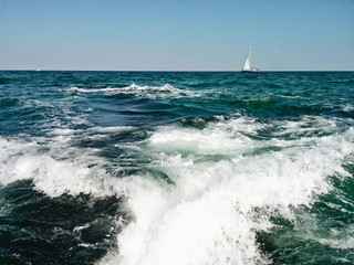 Yacht on the sea, waves.