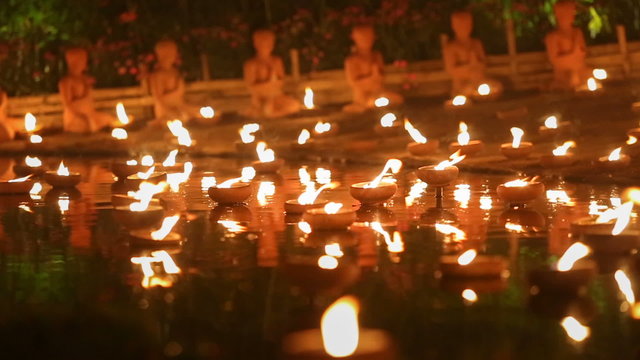 Magha puja day, Monks light the candle for buddha, Chiangmai,Thailand