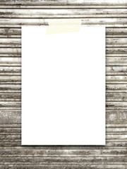Close-up of one paper sheet with tape on rusty metal shutter background