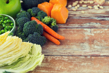 close up of ripe vegetables on wooden table