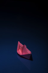 pink paper boat