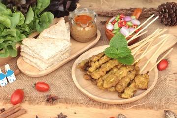 Pork satay,grilled pork with peanut sauce .