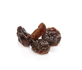Dried raisins on a white background