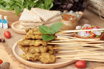 Pork satay,grilled pork with peanut sauce .