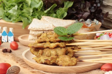 Pork satay,grilled pork with peanut sauce .
