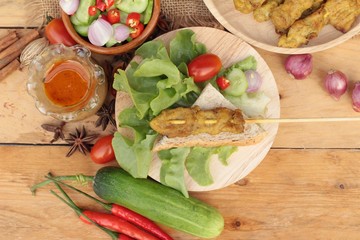 Pork satay,grilled pork with peanut sauce .