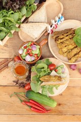 Pork satay,grilled pork with peanut sauce .