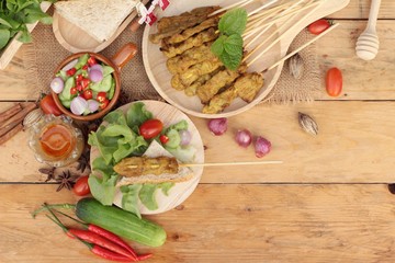 Pork satay,grilled pork with peanut sauce .