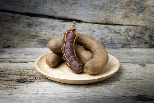  tamarind on grunge wooden background