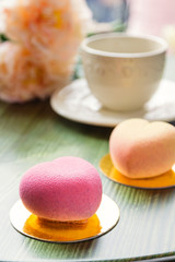 French mousse cake in pink chocolate velour