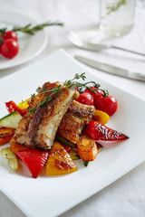 ribs and vegetables on the square plate