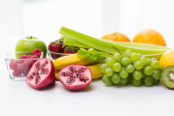 close up of fresh fruits and berries on table
