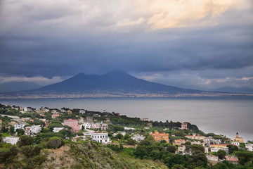 Fototapeta na wymiar Stunning view to posh district on Naples, gulf and Vesuvius volcano 