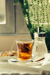 Cup of Healthy Tea over breakfast table