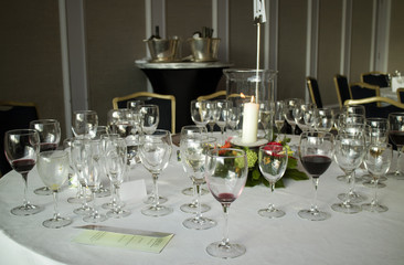 Aftermath of a lunch table with empty wine glasses