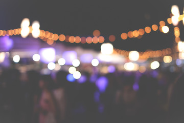 De-focused night street market in blurry background