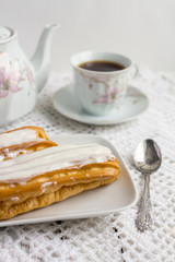 Dessert Eclair with whipped cream